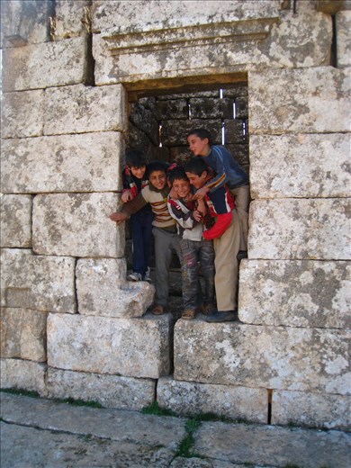 Syrian children playing between the ruins of a Byzanthine house.