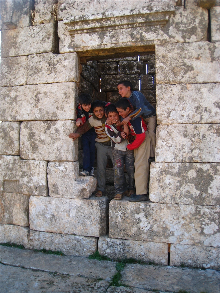 Syrian children playing between the ruins of a Byzanthine house.