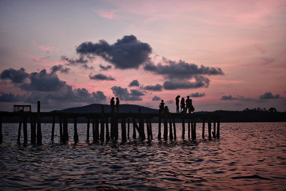 Villagers on the dock of Koh Rong Saloem waiting to welcome us into their homes