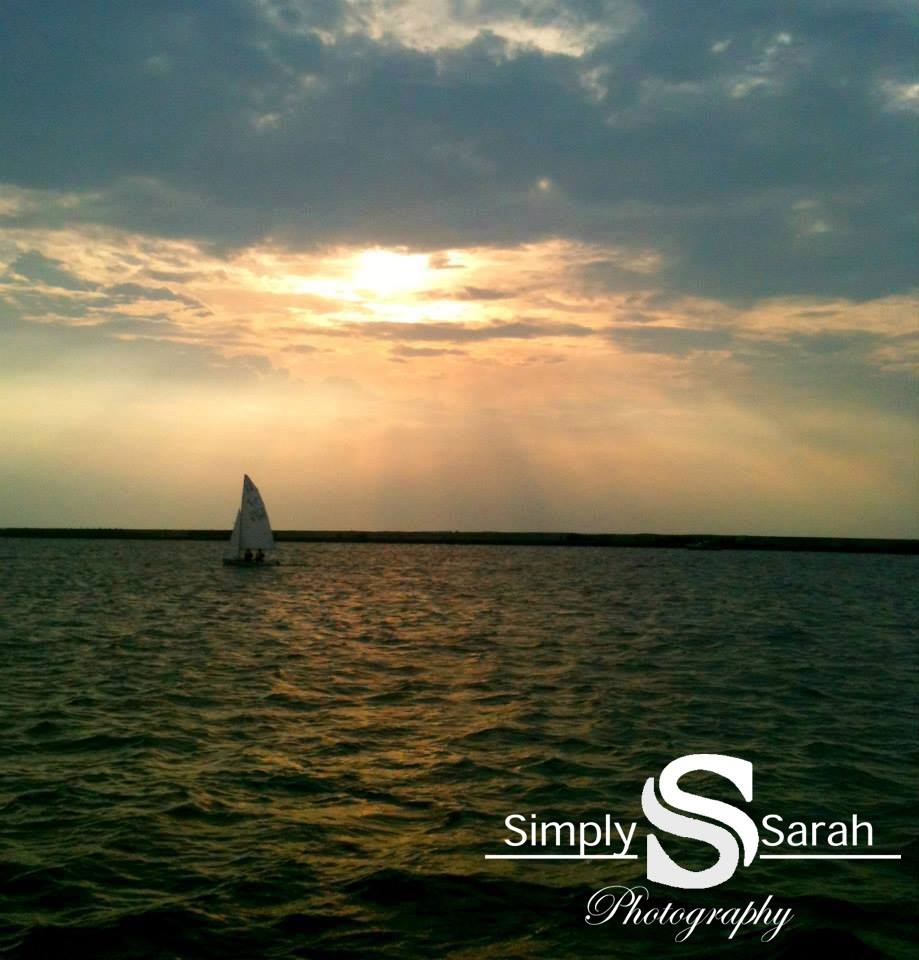 a boat on Lake Erie with a nice sun set