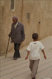 An old and young man going in different directions in Medina.: by szymczykeva, Views[340]
