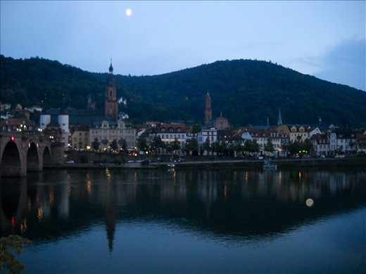 Two moons, as seen from the bank of the Neckar River, in Heidelberg, Germany.