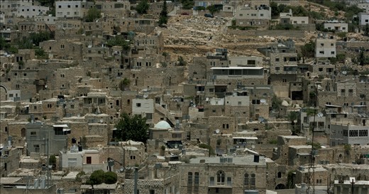 Through a process of rapid settlement expansion, and the very tactical nature in which this is done, Palestinian families are being forced into increasingly smaller spaces for habitation. The West Bank city of Hebron is a perfect example, with many areas of the cities looking more reminiscent of favela's than city dwellings. The hill pictured in this photograph was bombed extensively in the 2000 Intifada. 