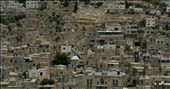 Through a process of rapid settlement expansion, and the very tactical nature in which this is done, Palestinian families are being forced into increasingly smaller spaces for habitation. The West Bank city of Hebron is a perfect example, with many areas of the cities looking more reminiscent of favela's than city dwellings. The hill pictured in this photograph was bombed extensively in the 2000 Intifada. : by takenbytom, Views[276]