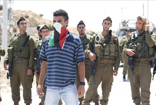 As protests and demonstrations are such an integral part of the lives of Palestinians, I spent much of my time attending these events in the hope to portray another side to them that is not necessarily as readily aired on Western media coverage. This particular protest started as a football match, with the Palestinian pictured playing as the goal keeper. With the emphasis being put on the peaceful nature of the protest, it was discouraging to see how rapidly the army resorted to heavy-handedness and tear-gas. 