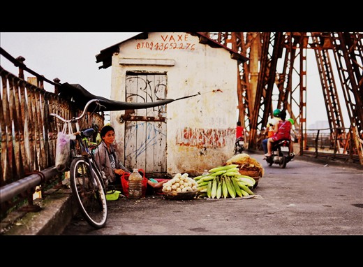 Afternoon marketplace on Long Bien Bridge.