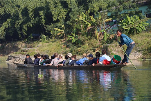 Science students take their daily canoe ride to the field where they will spend the next few weeks carrying out important ecological research