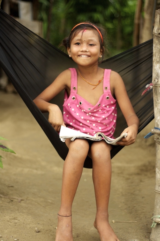 The Tharu tribe is a tribe native to the plains of Chitwan. In today’s times this tribe has been reduced to a group of landless farmers living in extreme poverty. Oblivious to her family’s financial condition, little Anita giggles away as she poses for the camera.