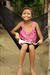 The Tharu tribe is a tribe native to the plains of Chitwan. In today’s times this tribe has been reduced to a group of landless farmers living in extreme poverty. Oblivious to her family’s financial condition, little Anita giggles away as she poses for the camera.: by tanayasurve, Views[898]