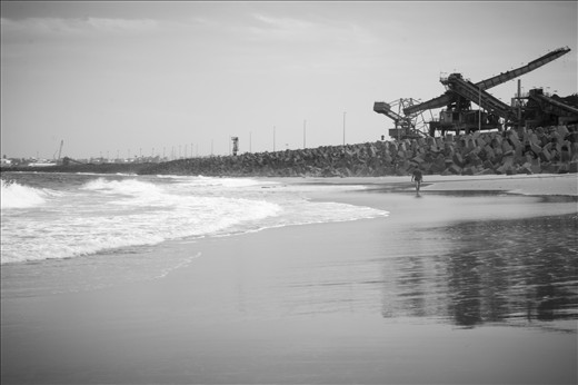 The proximity of coal mining to the main beach of the city scares away a lot of tourist but leaves not much choice for locals.