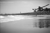 The proximity of coal mining to the main beach of the city scares away a lot of tourist but leaves not much choice for locals.: by tania, Views[262]