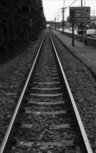 Step out of your home and onto the railway tracks. 
