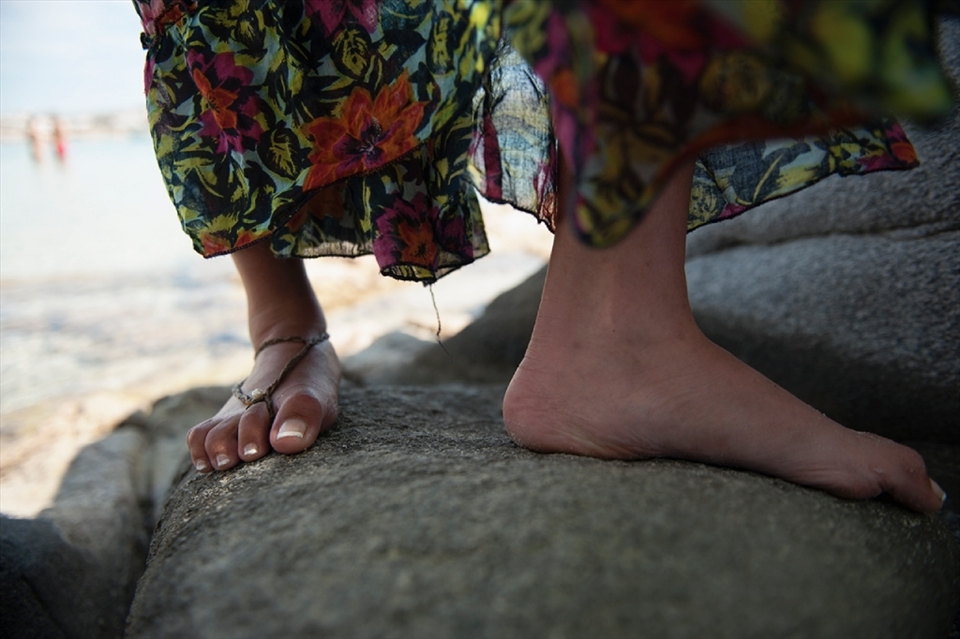 Kolymbithres beach, Paros, Greece. Easter 2013
Konstantina's feet with a foot jewellery she made by herself.