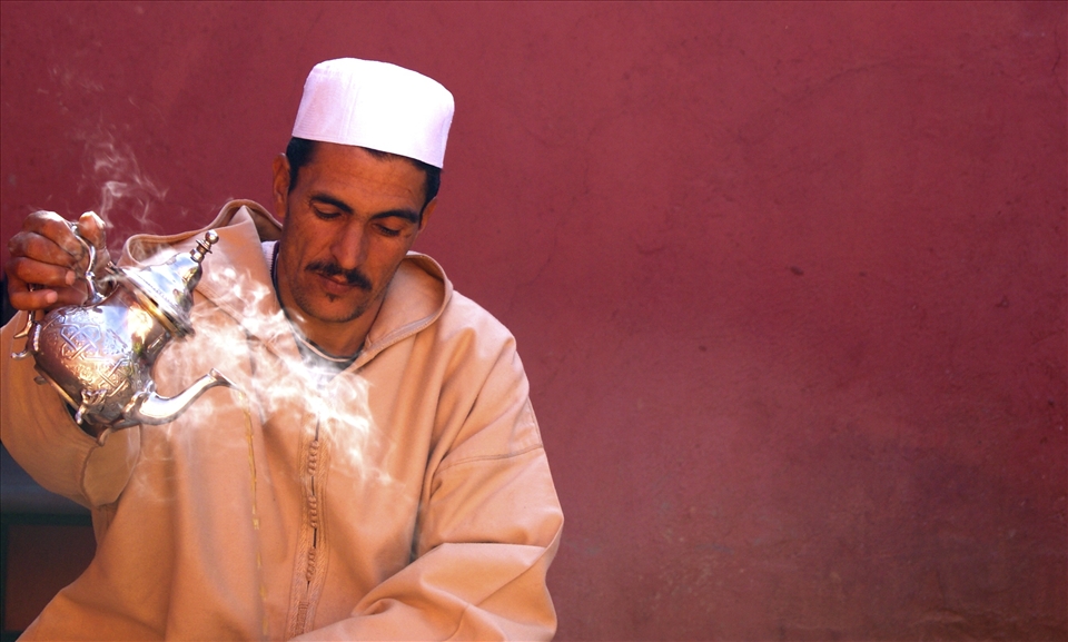 A berber in the Atlas Mountains preparing a mint tea for his guests