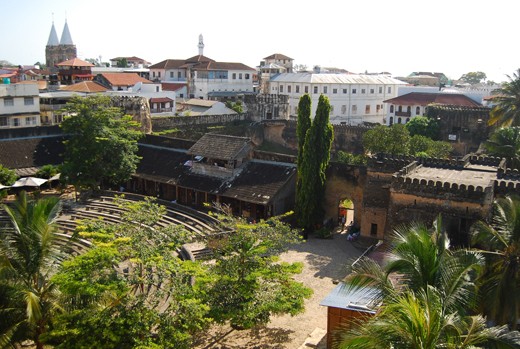 Bell towers and minarets rising above the castles and palaces of Stone Town