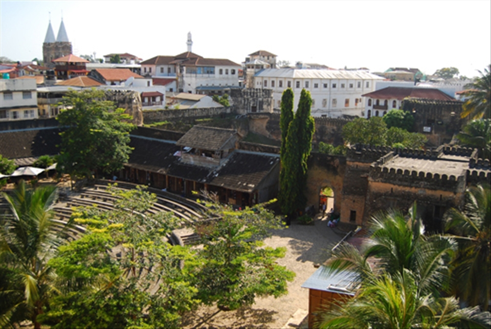 Bell towers and minarets rising above the castles and palaces of Stone Town