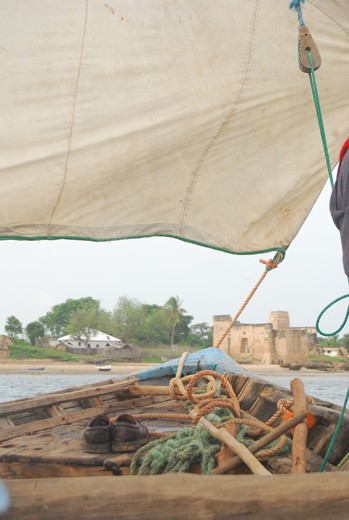 Small fisherman boats are the only way to get to the ruins of once busy Kilwa