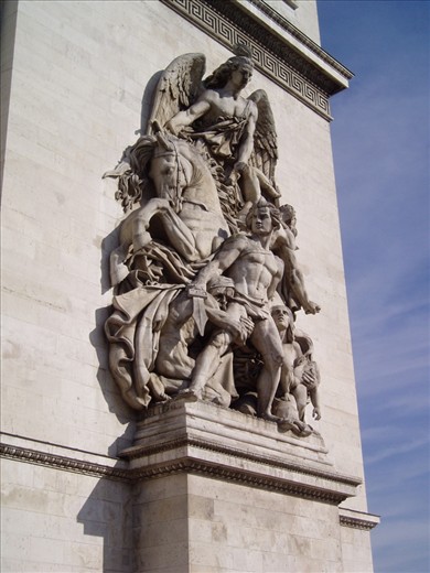 Arc de Triomphe, mighty are the stones against the sky. Paris France