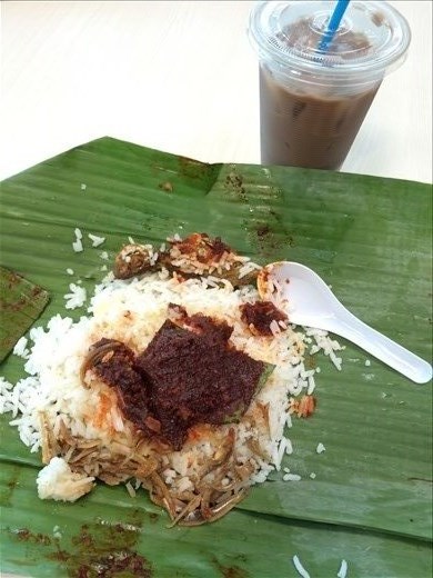 The Nasi Lemak I had at a night market in KL. Just how I remembered it, served warm and wrapped in a banana leaf. Ice Milo helped mellow the spice from the sambal. 