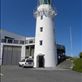 This is the replica lighthouse, built and maintained by the Cape Egmont Boat Club. When the original lighthouse was automated, they wanted to save the original lens, so they built a replica lighthouse and mounted the lens in here. They also turned it into a museum.: by taylortreks, Views[450]