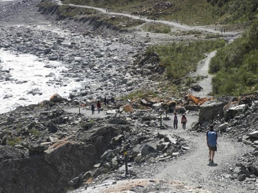 Anna waits at the bottom of the steep path.