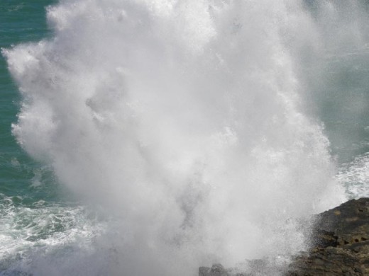 SPLOOSH! Still fascinated by the waves. Especially when they splash against the cliffs.
