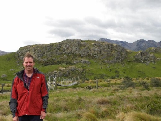 Uh-oh. Kent has to cross a swinging bridge...