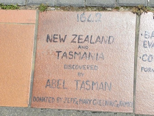 The sidewalk near the water was bordered by these tiles with historical dates.
