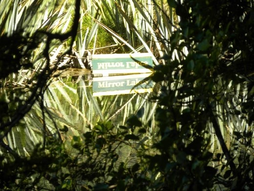 A clever sign allows you to see Mirror Lake live up to its name!