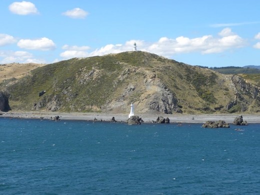 Pencarrow Head. The lighthouse at the top of the hill was the first lighthouse in NZ.