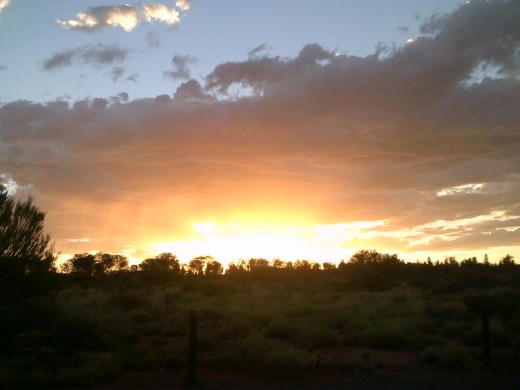 Then we turned around to see the actual sunset, instead of the sun playing on Uluru.