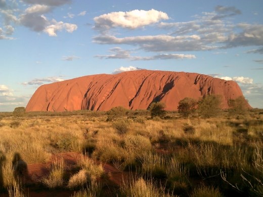 Uluru is glorious in bright sunshine.
