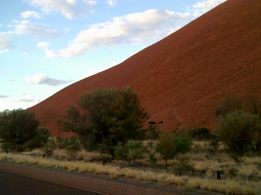 As the sun fades, the rock becomes a deeper red. We look forward to returning to Uluru.