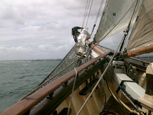Stan ventures waaaaay out to the front of the bow to attach a camera.