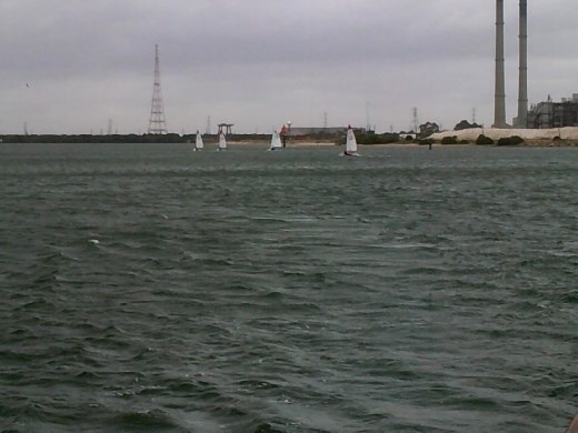 A small boat race in the river mouth.