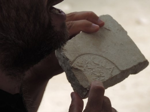 This stone shows the hallmark that a Belgian archeologist used to date the ruins.