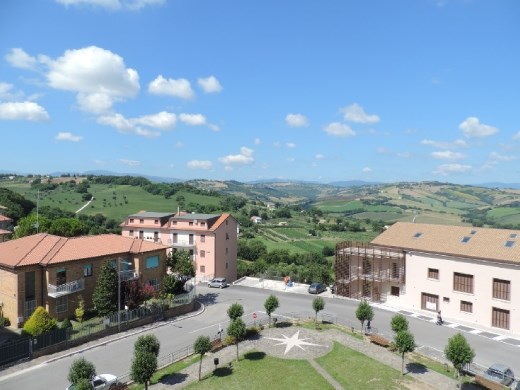 Looking out, the views of the countryside ain't so bad, either. This is our favorite past time, looking over the hills of Le Marche.