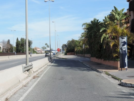 See that stop sign? It's the entrance to the highway. Luckily, the speed limit is only 80 kph, so it's relatively easy to get up to speed. The Spanish drivers are also nice and move over so you have room to accelerate. Our condo is just to the right of the wall.