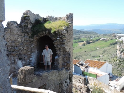 Kent is standing watch in the guard tower.