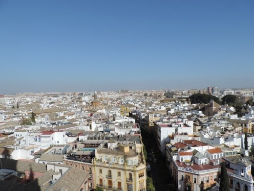 Anna is reaching for her asthma inhaler while Kent takes photos. We made it. Kent thinks the views are worth it. Anna has doubts...