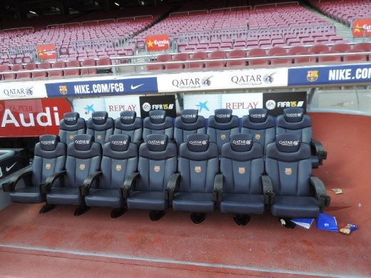 Nope, not leftover auto seats. This is where the Barcelona players sit during the game.