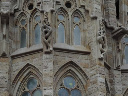 Serpents on the Glory Facade represent sin that tempts man.