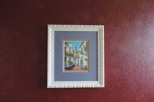 This is one of our favorite prints from our trip to Spain. It shows the quintessential Spanish village with whitewashed houses and the cathedral towering above. We picked up this piece in a market across the street from the Mezquita (a Catholic cathedral converted from a Moslem mosque).