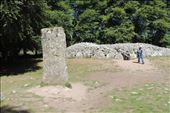 A large stone guards the NW Cairn as Kent's sister, Jacque, exits the cairn: by taylortreks, Views[309]