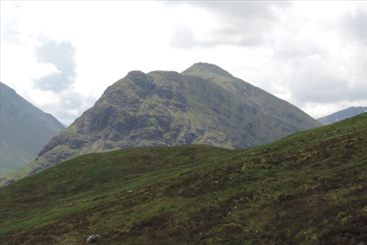 Sunlight dapples a nearby peak but thats for another day