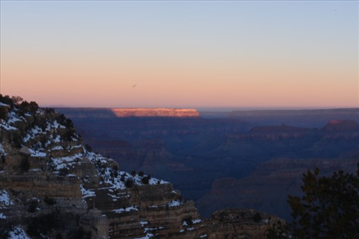 The first rays of sunlight painted the western wall of the Canyon.