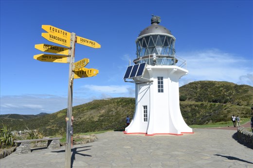 A distinctive signpost accompanies the well-known lighthouse at the Cape.
