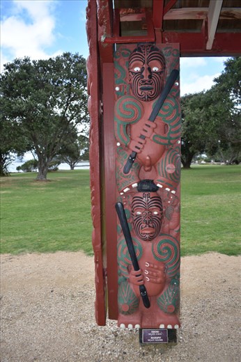 Carved Maori warriors guard the waka. The waka is launched only on 6 Feb, the anniversary of the signing of the Treaty of Waitangi. It takes 80 warriors to paddle the waka across the Russell Harbor.