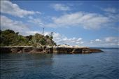 Primitive lighthouse points the way to Maori rock carvings.: by taylortreks, Views[244]