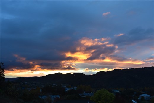Clouds light up with the first rays of sunshine.